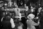Louis Armstrong and Billie Holiday in scene from jazz film New Orleans, ca. 1940s