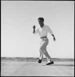 Sammy Davis, Jr. mid-1950s. I had an assignment to photograph Davis to show his multiple talents. We didn’t have a rehearsal studio with a blank wall to make the shots readable. So we found a building on Hollywood Boulevard that had a low roof edge – we could use the sky as our background. The pictures used in this sequence are five out of maybe three hundred. My technical knowledge of dance was zero; I had to go by instinct. Davis was great. Finally we had the shots, and as we were packing up, he looked at me as if he wanted to do some more. “What’s the matter?” I said. “Are you crazy?”
“No,” he said. “I love to dance!”