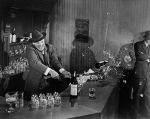Burt Lancaster smashing booze bar in Elmer Gantry, 1959