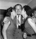 John Wayne with his daughters Melinda (14) and Antonia (18, with bow on dress).